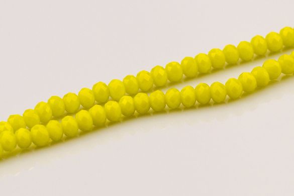 Хрусталь бусины 4 мм, ~140 шт / нить, на нитке, флюорисцентно желтый не прозрачный.