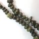 Змеевик прессованный бусины ширина 8-14 мм, длина нитки 45 см, крошка, натуральные камни, темно-зеленый