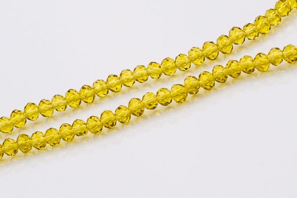 Хрусталь  бусины 4 мм, ~140 шт / нить, на нитке, желто-золотой прозрачный.