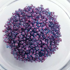 Бісер 1,5-2 * 1,5-2 мм, упаковка 10 гр, прозорі з забарвленням всередині, синій з рожевою серцевиною